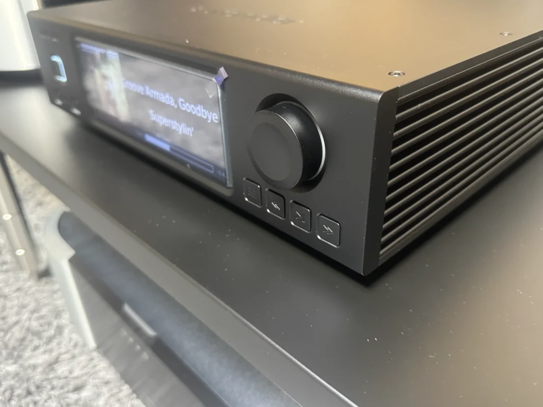 Aurender A1000 music server showing the machined aluminium chassis, front display and side cooling fins
