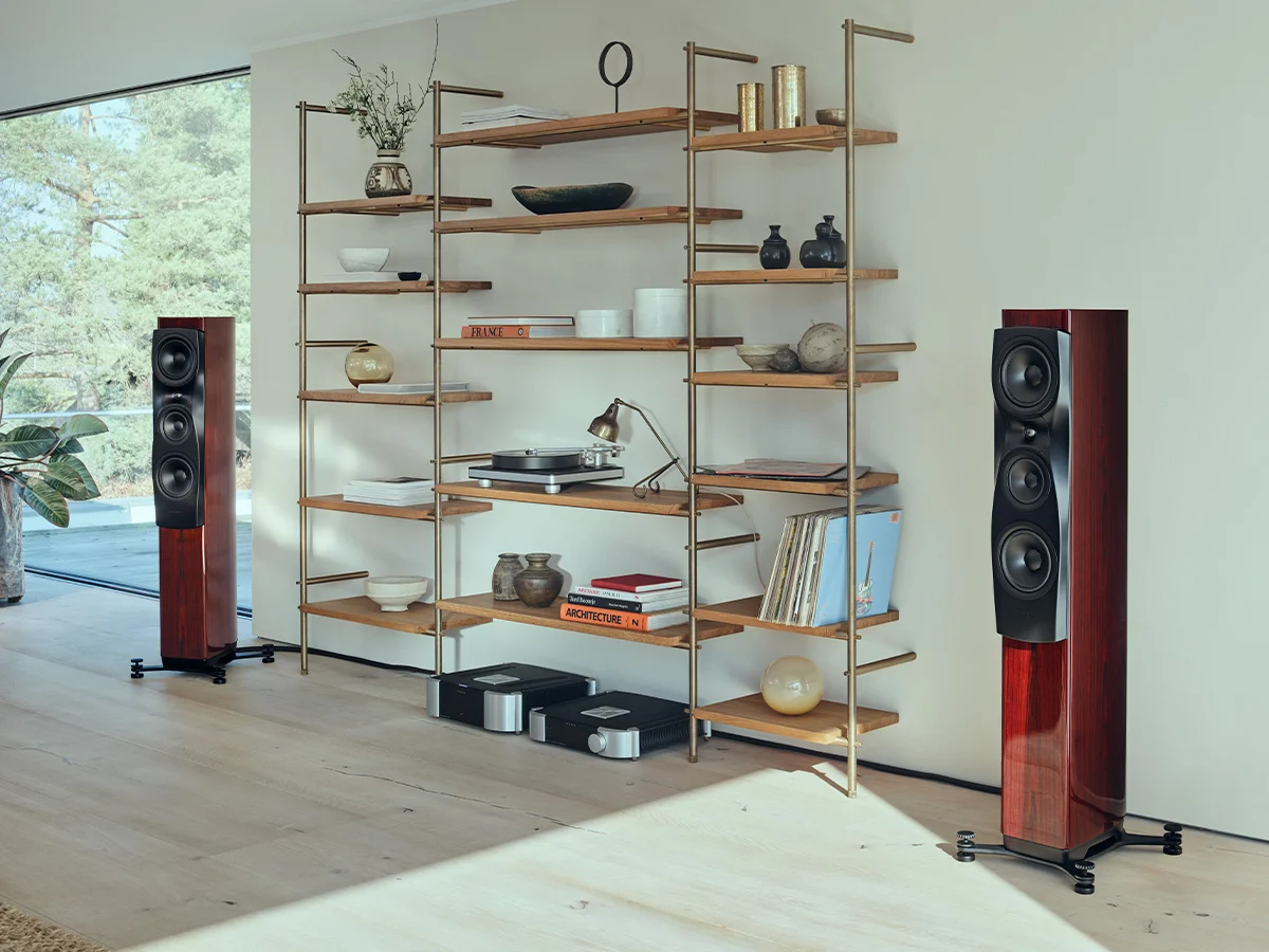 Dynaudio Confidence 30i floorstanding speakers in Ruby Wood High Gloss in a modern listening room